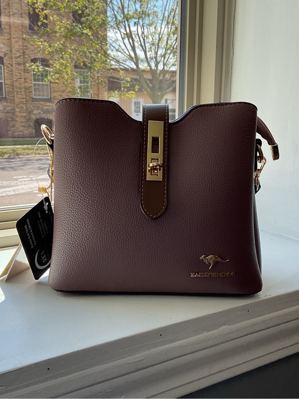 Brown Leather Bucket Bag with Gold Hardware